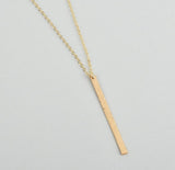 Vertical long and skinny hammered bar necklace